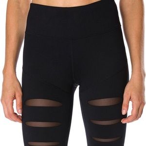 Betsey Johnson black slashed front ankle legging